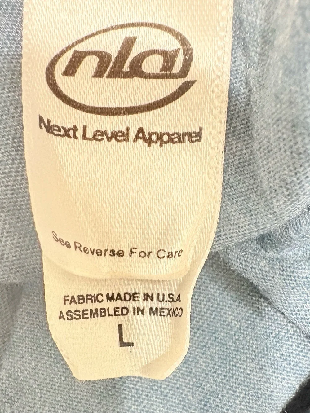 Next Level Apparel light blue heather vintage graphic ringer tee